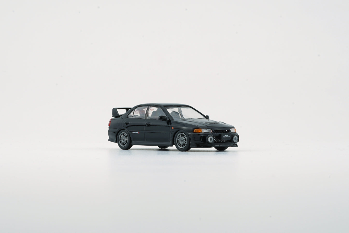 BMC 1:64: Mitsubishi Lancer EVO- BLK (LHD)- 64B0280