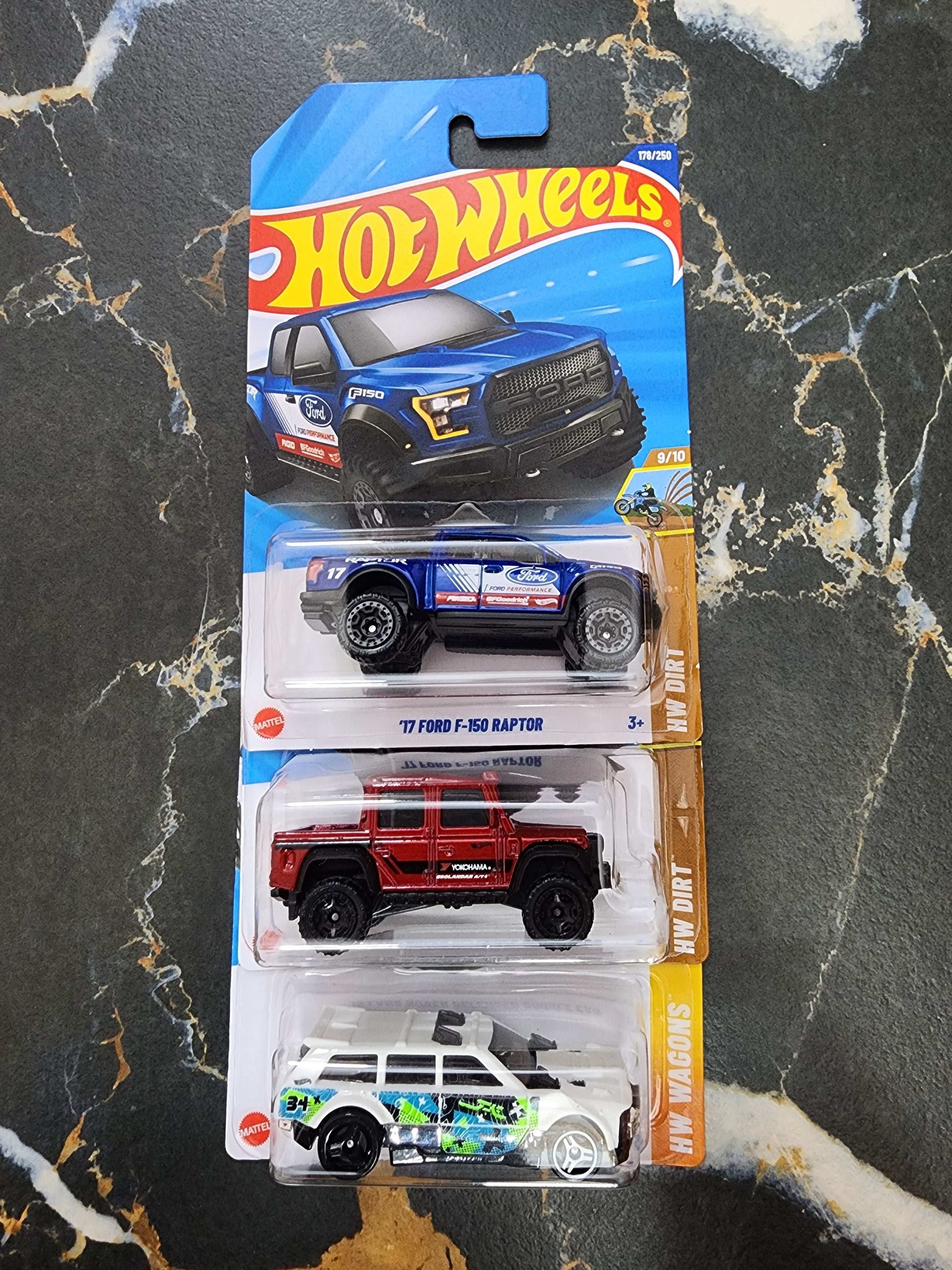 Hot Wheels Off-Road & Fantasy Trio: '17 F-150 Raptor, '15 Defender Double Cab, & Track Dwagon (3-Car Set -15)