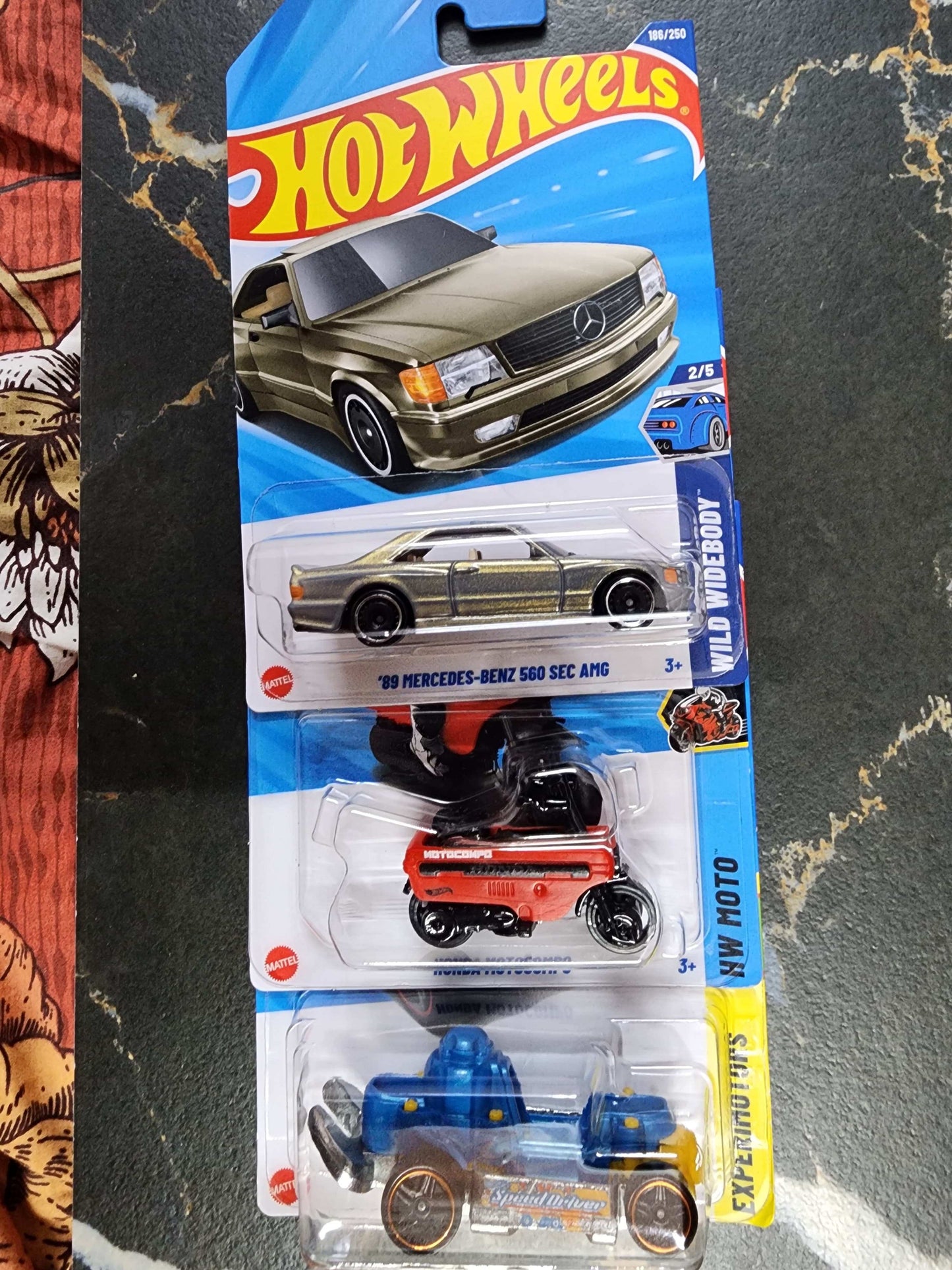 Hot Wheels Eclectic Icons: '89 Mercedes 560 SEC AMG, Speed Driver, & Honda Motocompo (3-Car Set - 20)